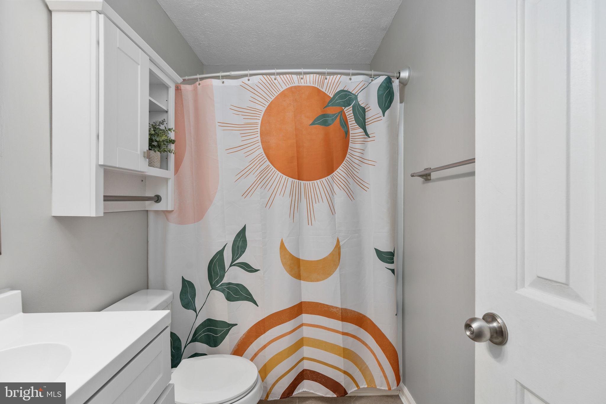 15195 Dyers Road Woodbridge, VA 22193 - Photo 29 of 53 a bathroom with a sink mirror and toilet