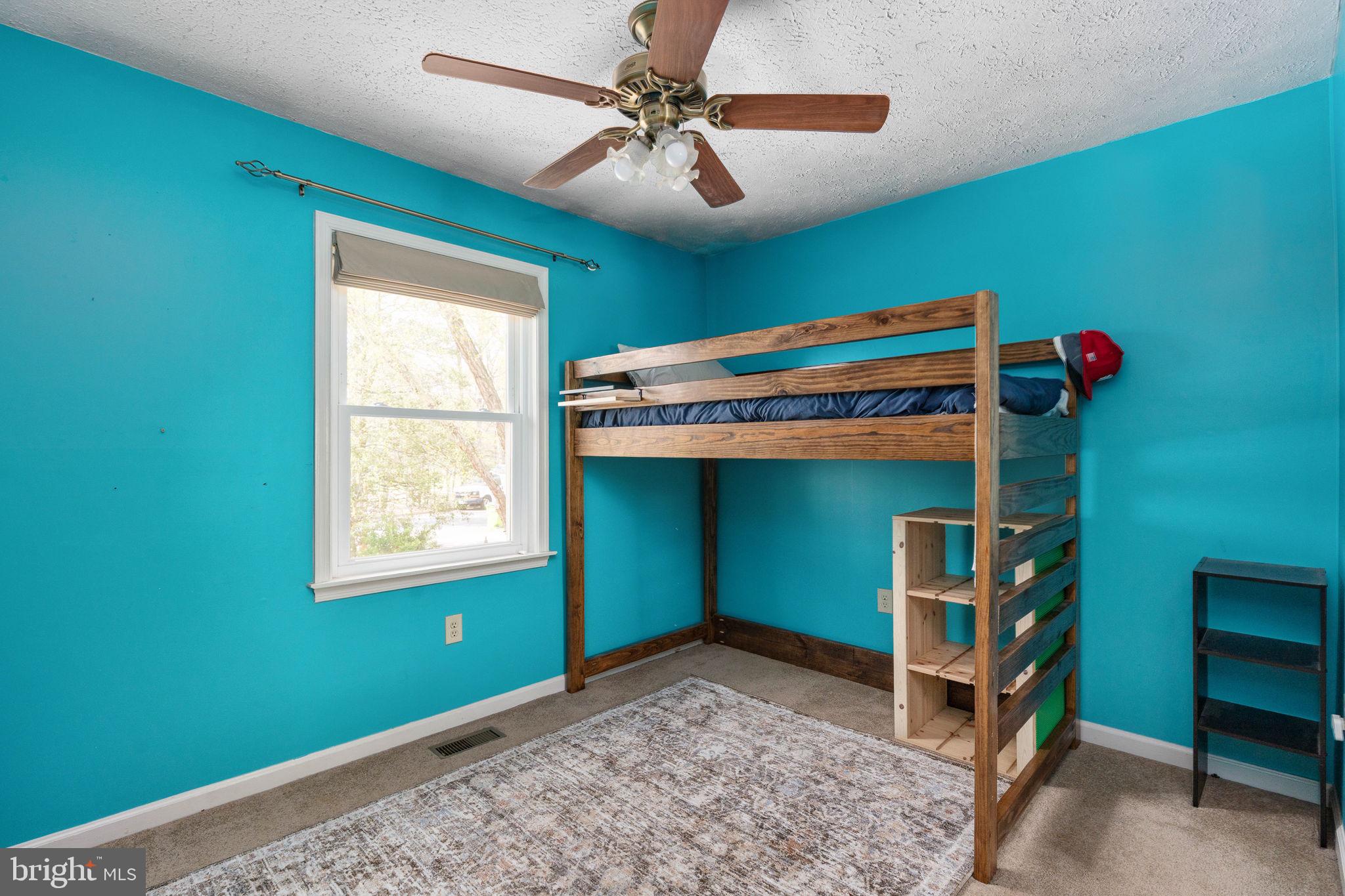 15195 Dyers Road Woodbridge, VA 22193 - Photo 31 of 53 a bedroom with a bed and a window