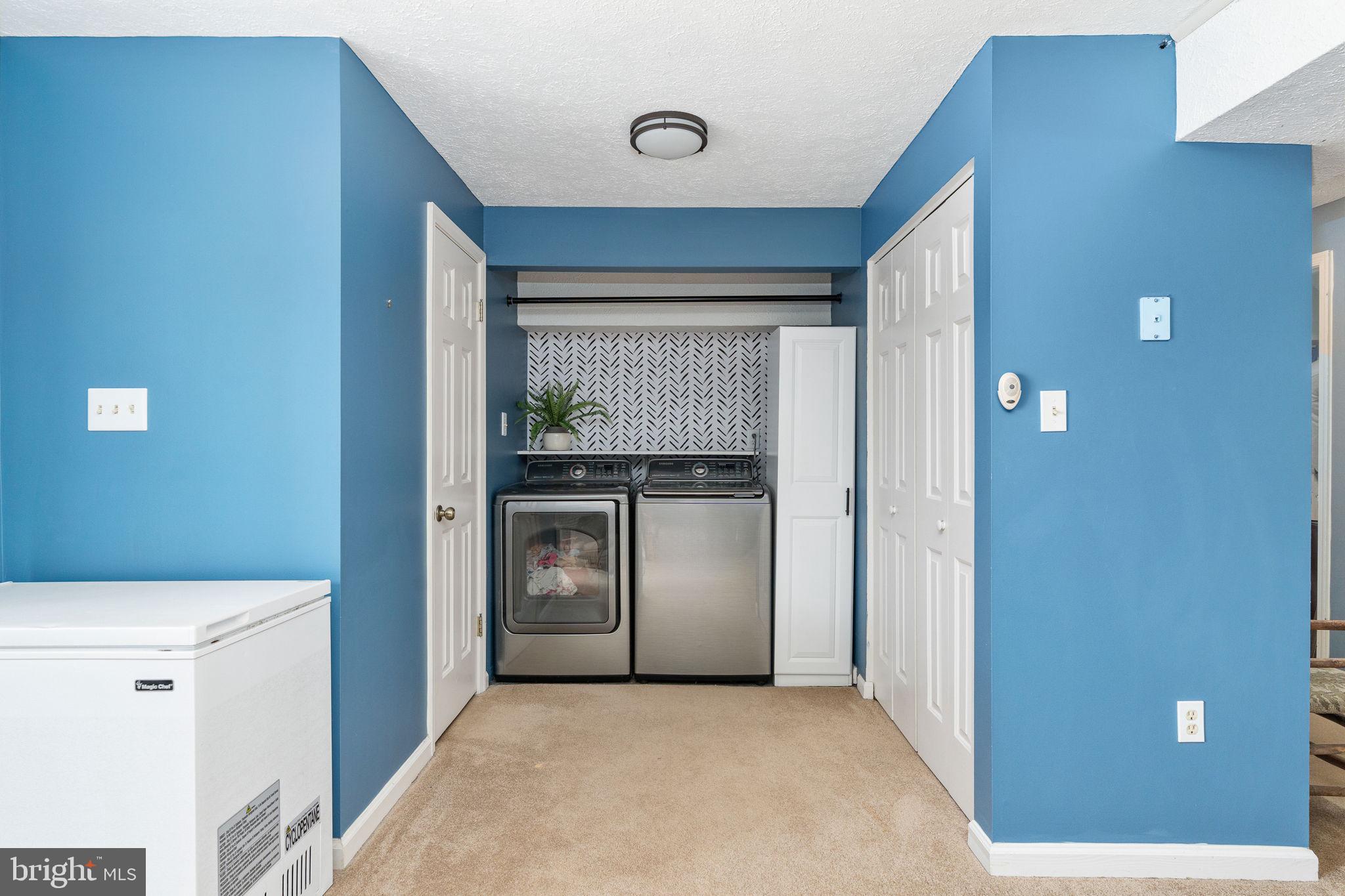 15195 Dyers Road Woodbridge, VA 22193 - Photo 36 of 53 a view of hallway with washer and dryer
