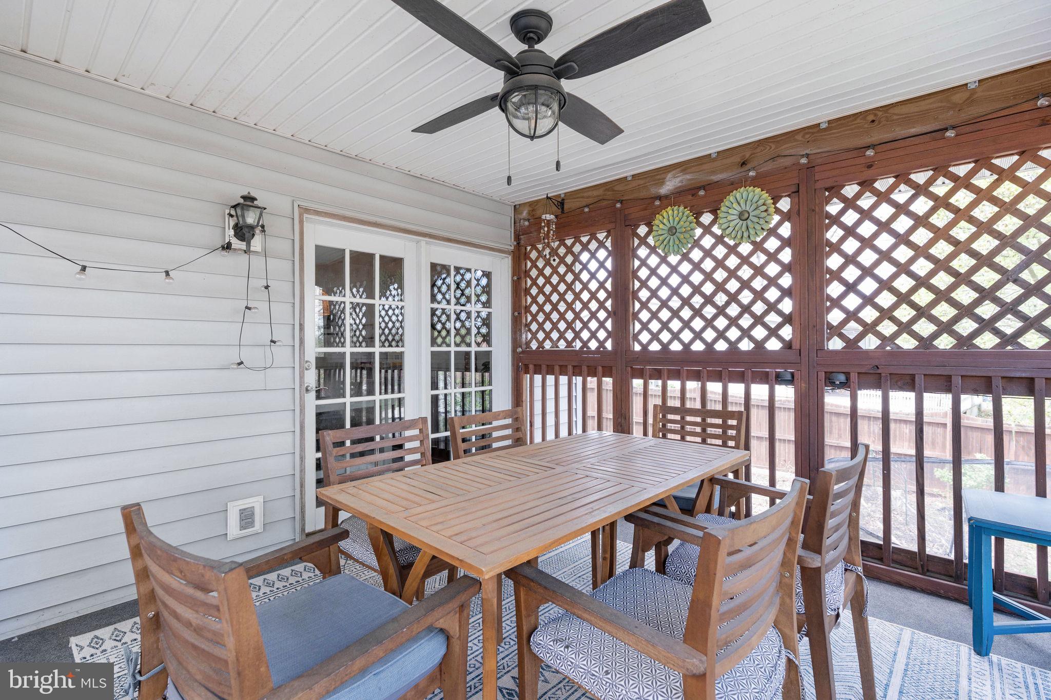15195 Dyers Road Woodbridge, VA 22193 - Photo 39 of 53 a view of a patio with a table and chairs