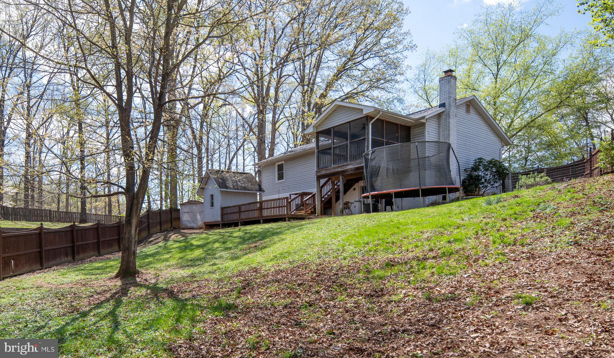 15195 Dyers Road Woodbridge, VA 22193 - Photo 49 of 53 a view of a house with a yard