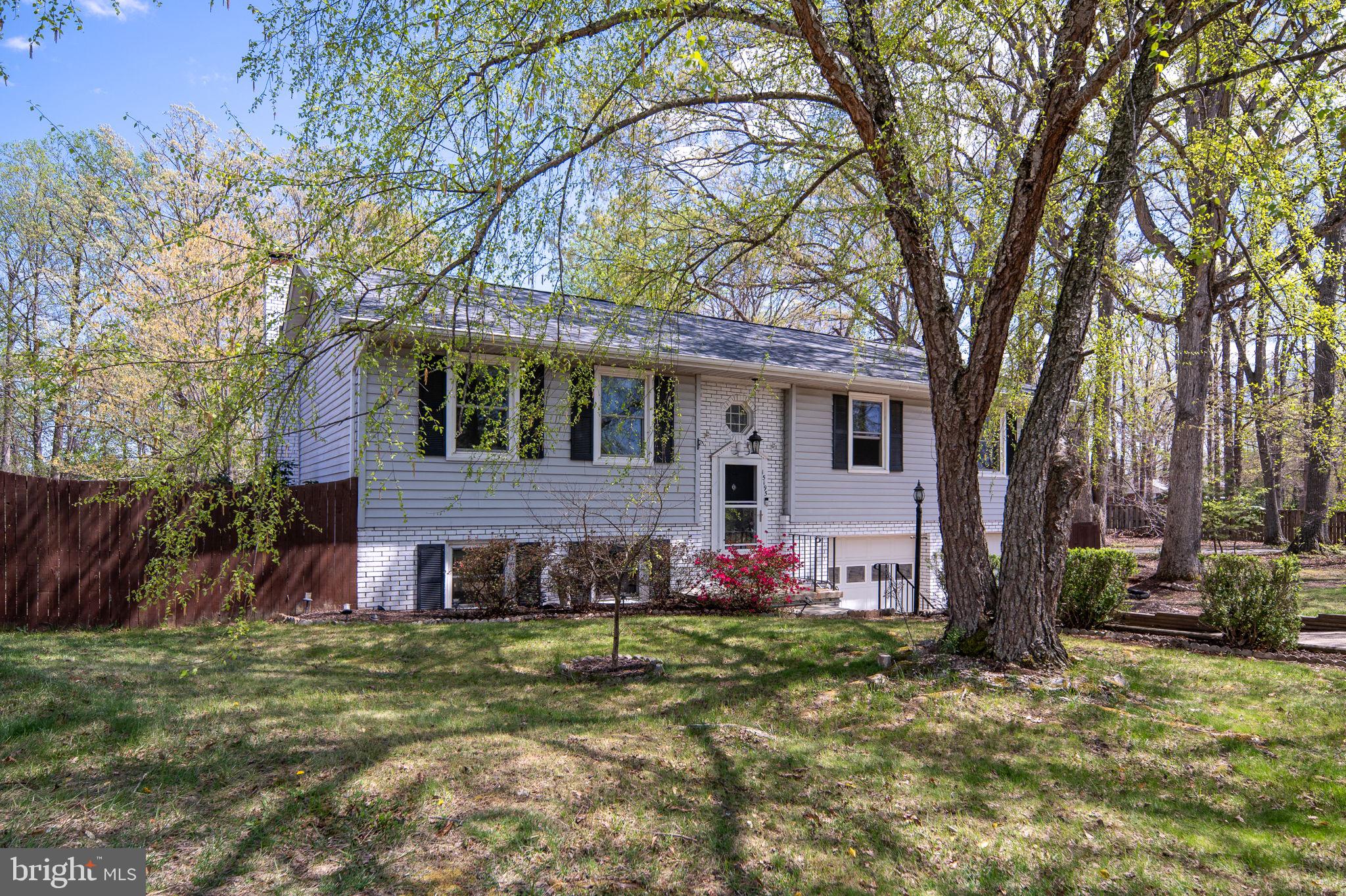 15195 Dyers Road Woodbridge, VA 22193 - Photo 6 of 53 a view of a house with a yard