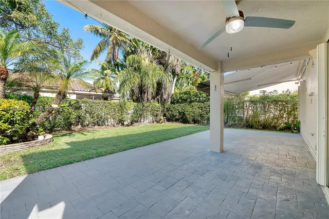 a view of a garden with an outdoor space
