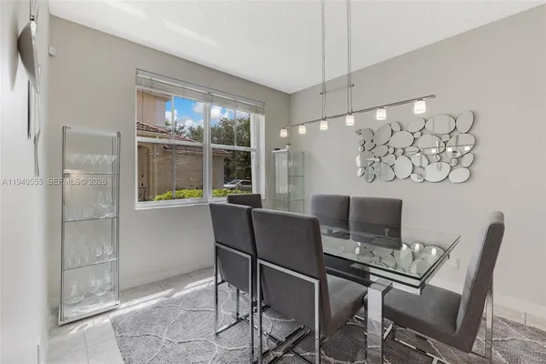 a work room with furniture and a window