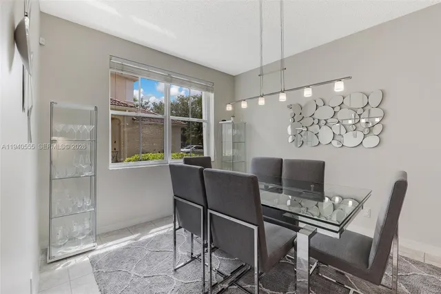 a work room with furniture and a window