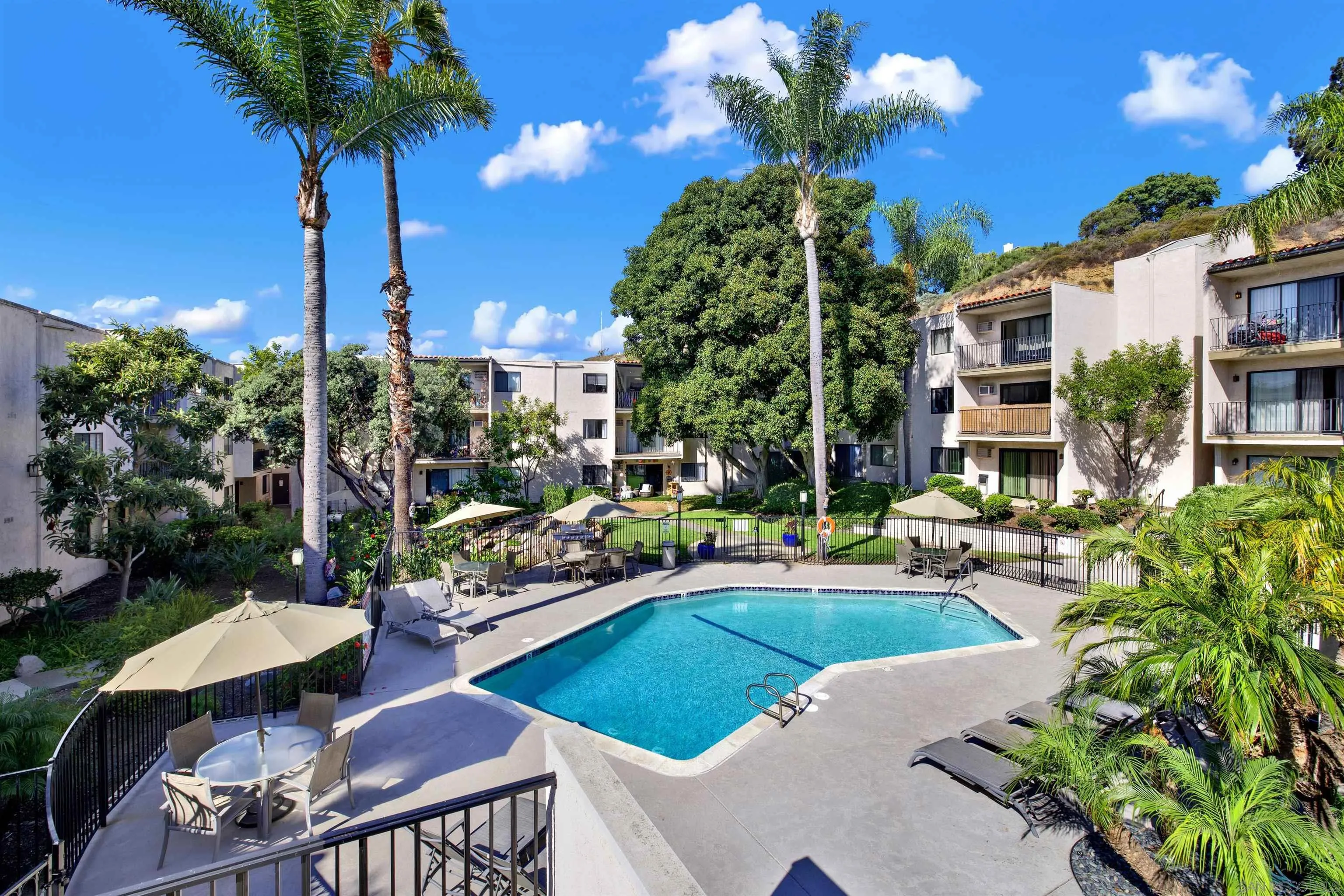 6780 Friars Road, Unit 153 San Diego, CA 92108 - Photo 16 of 21 a view of a house with swimming pool and sitting area