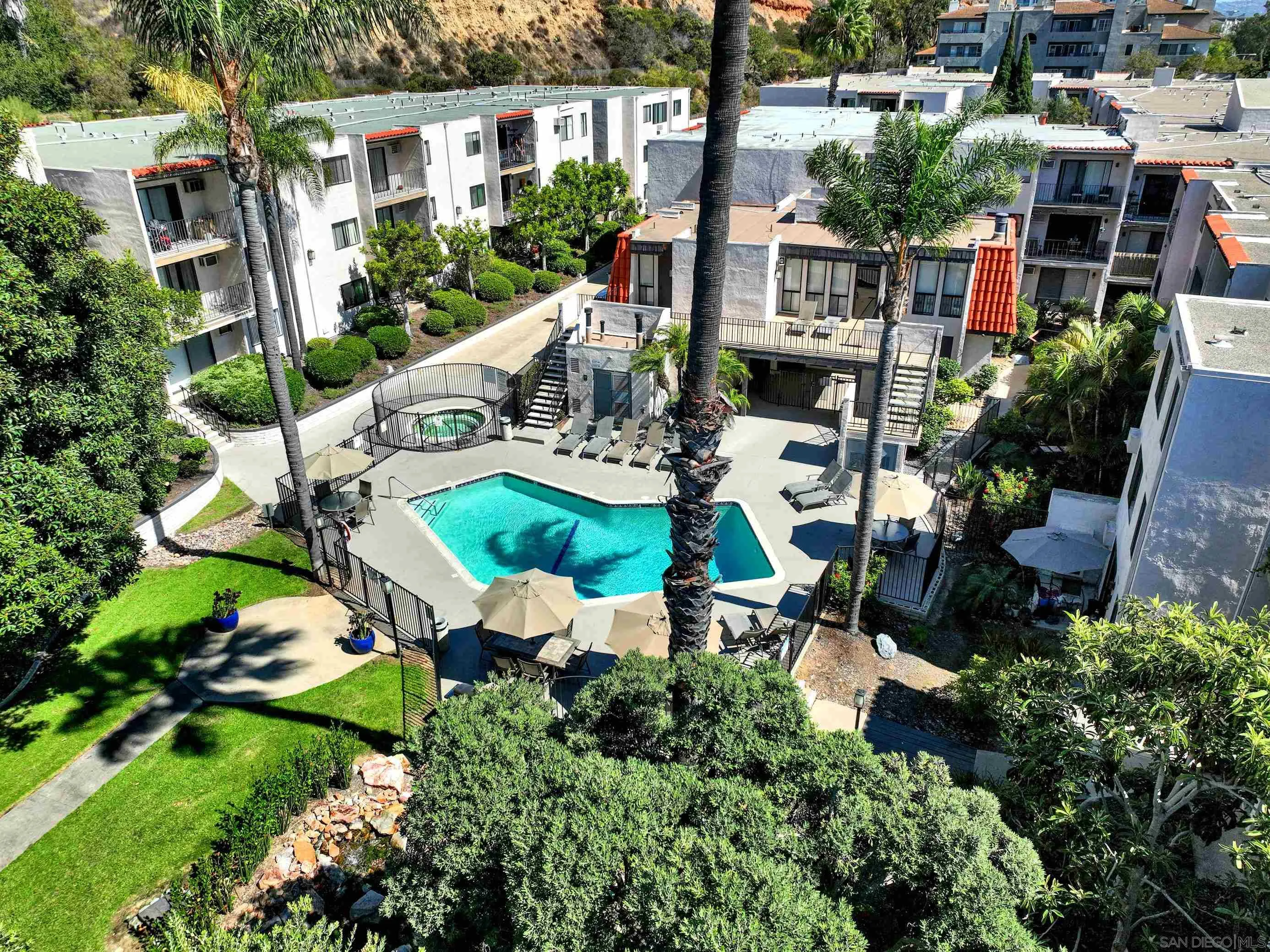 6780 Friars Road, Unit 153 San Diego, CA 92108 - Photo 17 of 21 a view of a house with backyard sitting area and garden