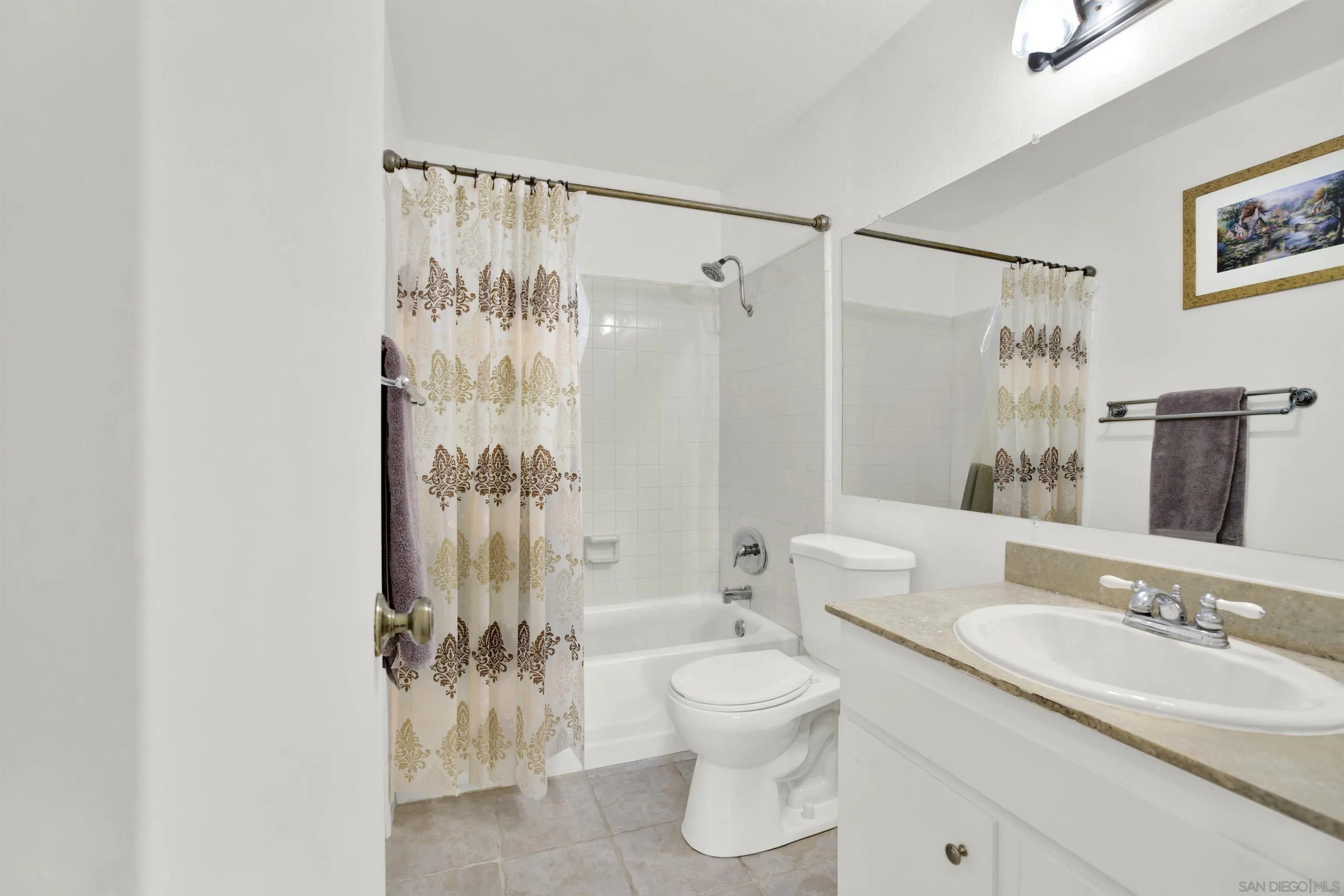 6780 Friars Road, Unit 153 San Diego, CA 92108 - Photo 9 of 21 a bathroom with a sink a toilet and shower