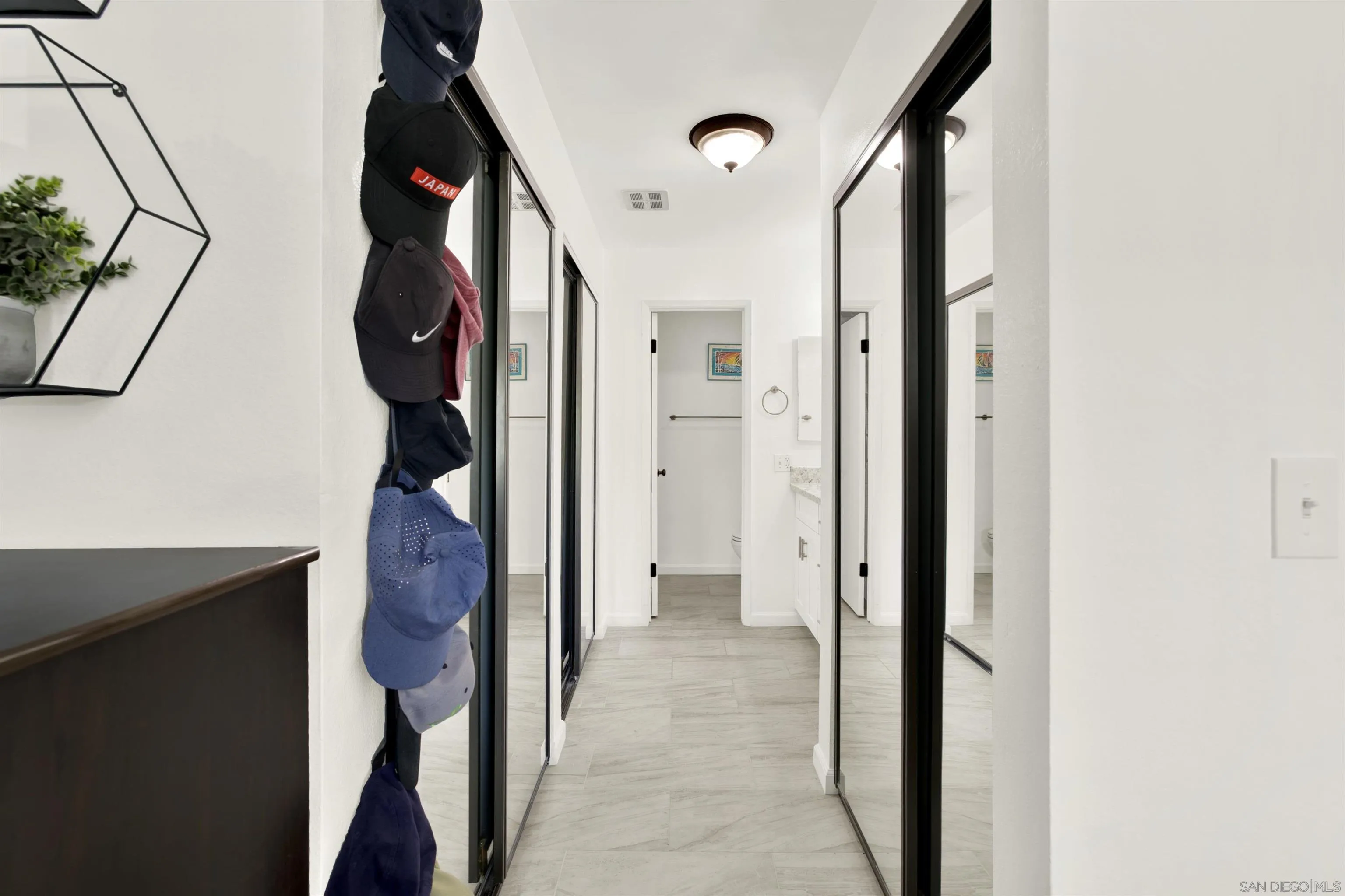 6780 Friars Road, Unit 153 San Diego, CA 92108 - Photo 10 of 21 a view of hallway with wooden floor