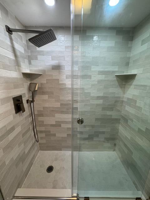 1030 Sugar Sands Boulevard, Unit 171 Singer Island, FL 33404 - Photo 14 of 20 a bathroom with a shower