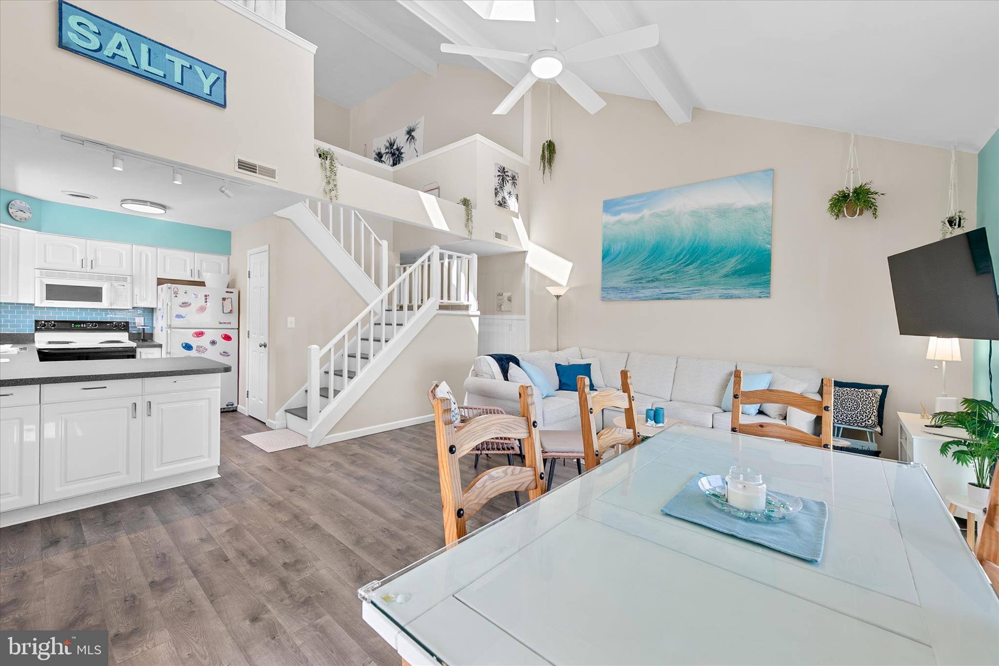 132 Jamestown Road, Unit 601 Ocean City, MD 21842 - Photo 6 of 37 a living room with furniture and wooden floor