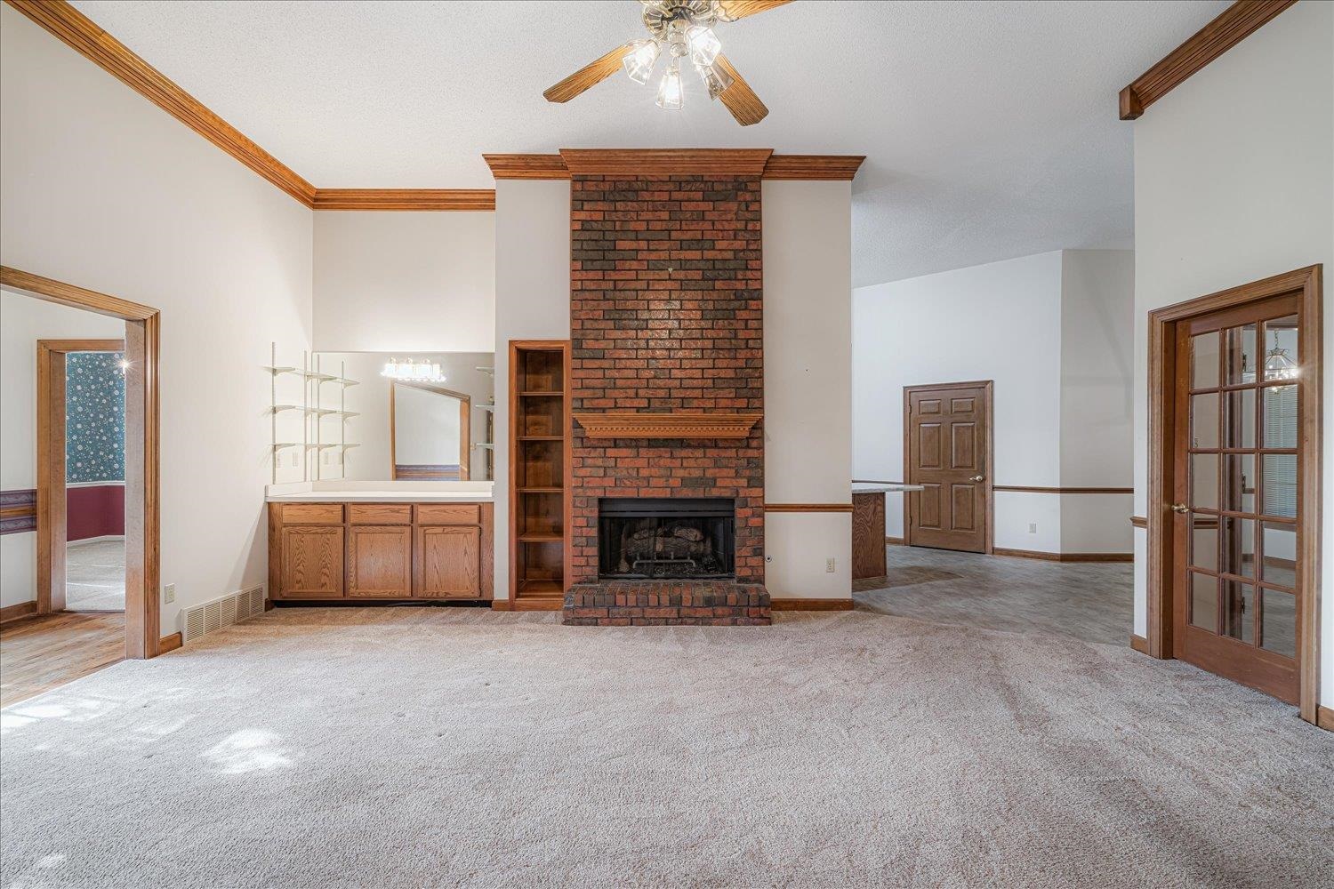 1665 Riverdale Road Germantown, TN 38138 - Photo 12 of 39 a view of a livingroom with furniture and a fireplace