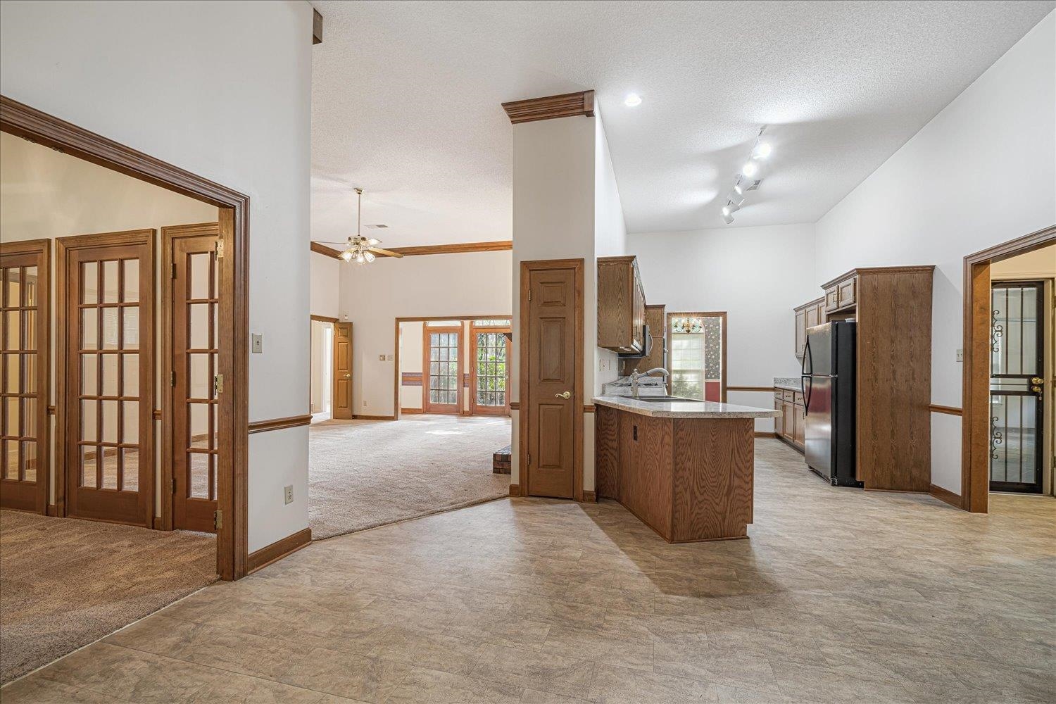 1665 Riverdale Road Germantown, TN 38138 - Photo 18 of 39 a large kitchen with a large window and stainless steel appliances