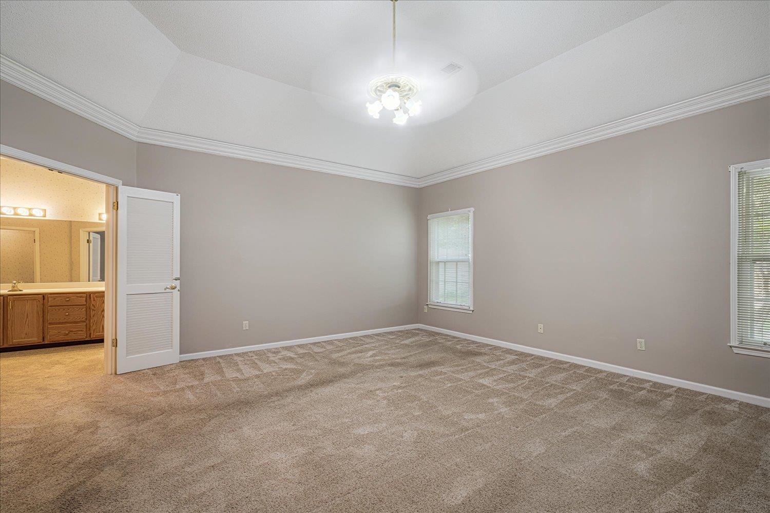 1665 Riverdale Road Germantown, TN 38138 - Photo 21 of 39 a view of an empty room with a window
