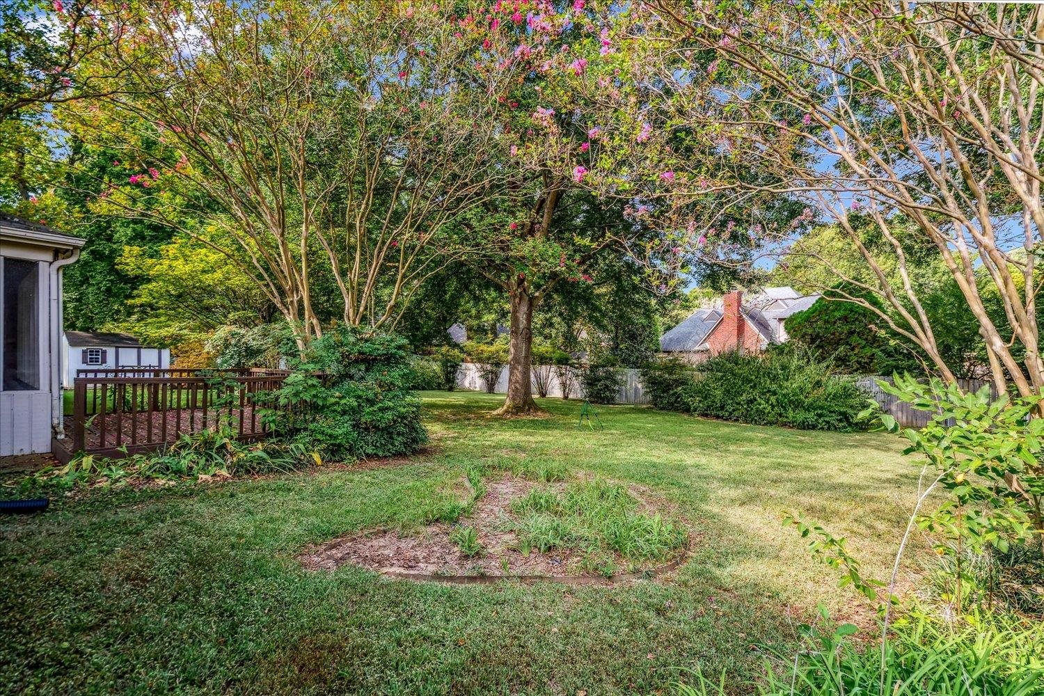 1665 Riverdale Road Germantown, TN 38138 - Photo 35 of 39 a front view of a house with a yard