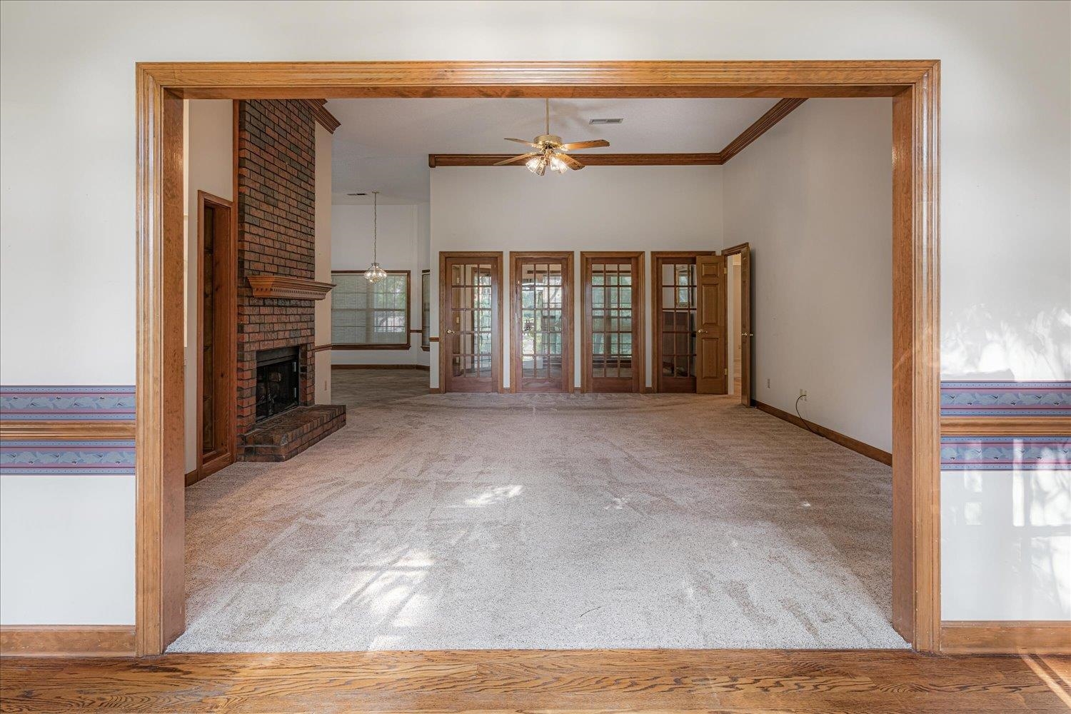1665 Riverdale Road Germantown, TN 38138 - Photo 8 of 39 a view of a livingroom with a staircase