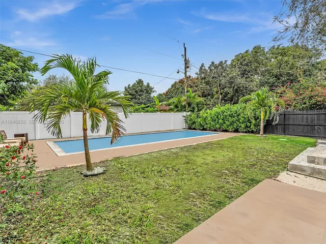 a house view with a garden space