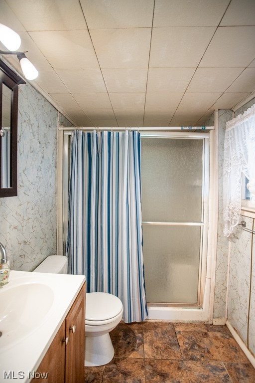 7687 Mines Road Southeast Warren, OH 44484 - Photo 26 of 30 Bathroom with a shower with shower curtain, large vanity, toilet, and tile flooring
