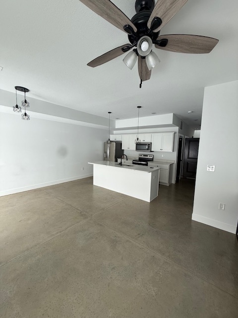 3304 Stoneway Court Champaign, IL 61822 - Photo 3 of 10 a kitchen with stainless steel appliances a cabinets and a refrigerator
