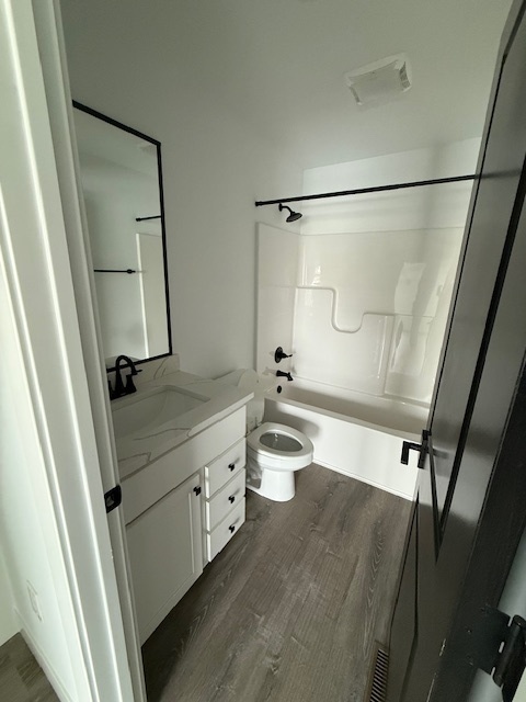 3304 Stoneway Court Champaign, IL 61822 - Photo 6 of 10 a bathroom with a double vanity sink toilet and mirror