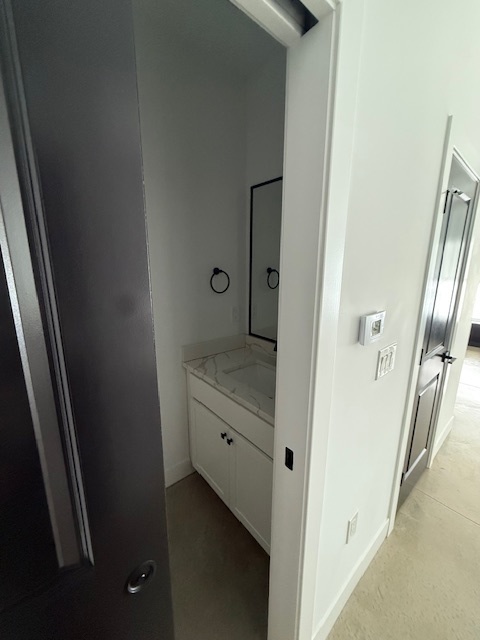 3304 Stoneway Court Champaign, IL 61822 - Photo 9 of 10 a bathroom with a granite countertop sink and a mirror