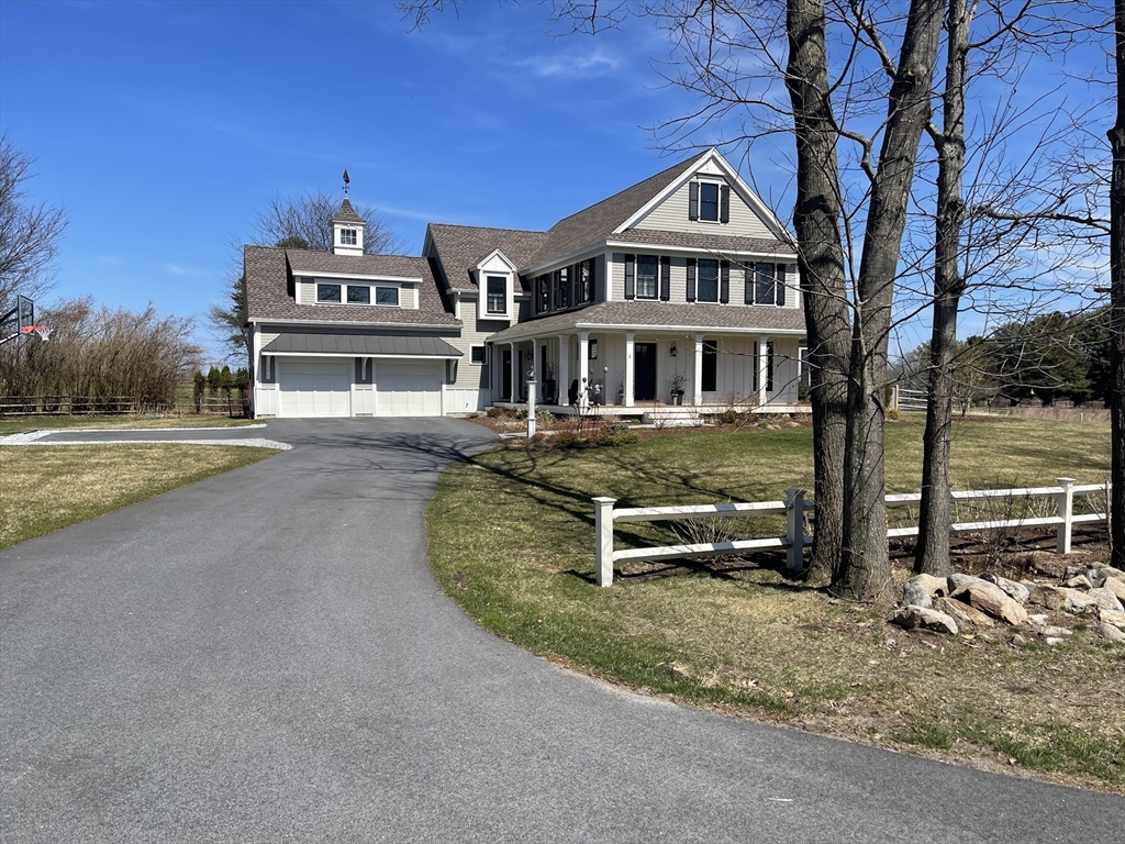 2 Chebacco Road Ipswich, MA 01938 - Photo 1 of 42 a front view of a house with a yard