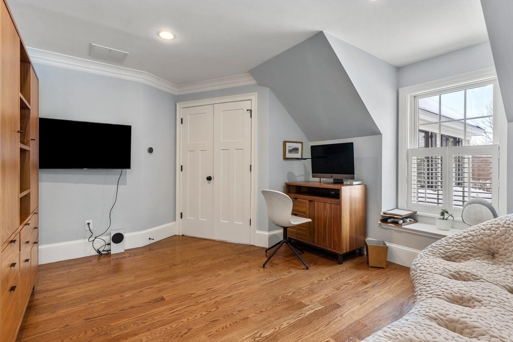 2 Chebacco Road Ipswich, MA 01938 - Photo 32 of 42 a living room with furniture and a flat screen tv