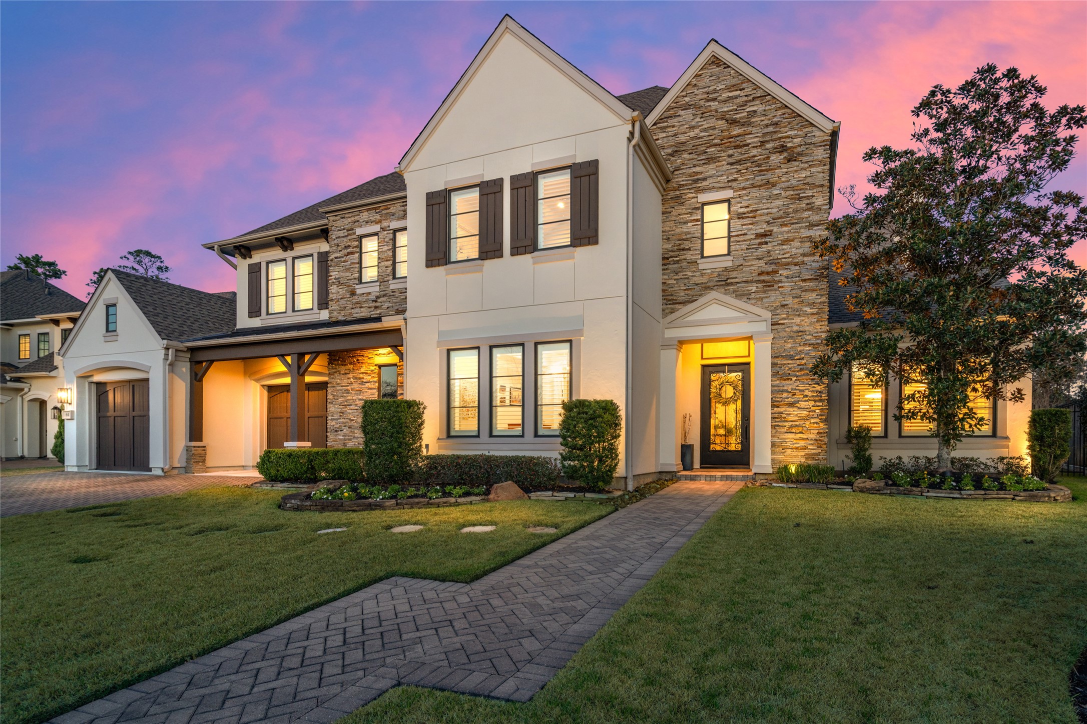 64 South Parkgate Circle Spring, TX 77381 - Photo 1 of 50 a front view of a house with a yard