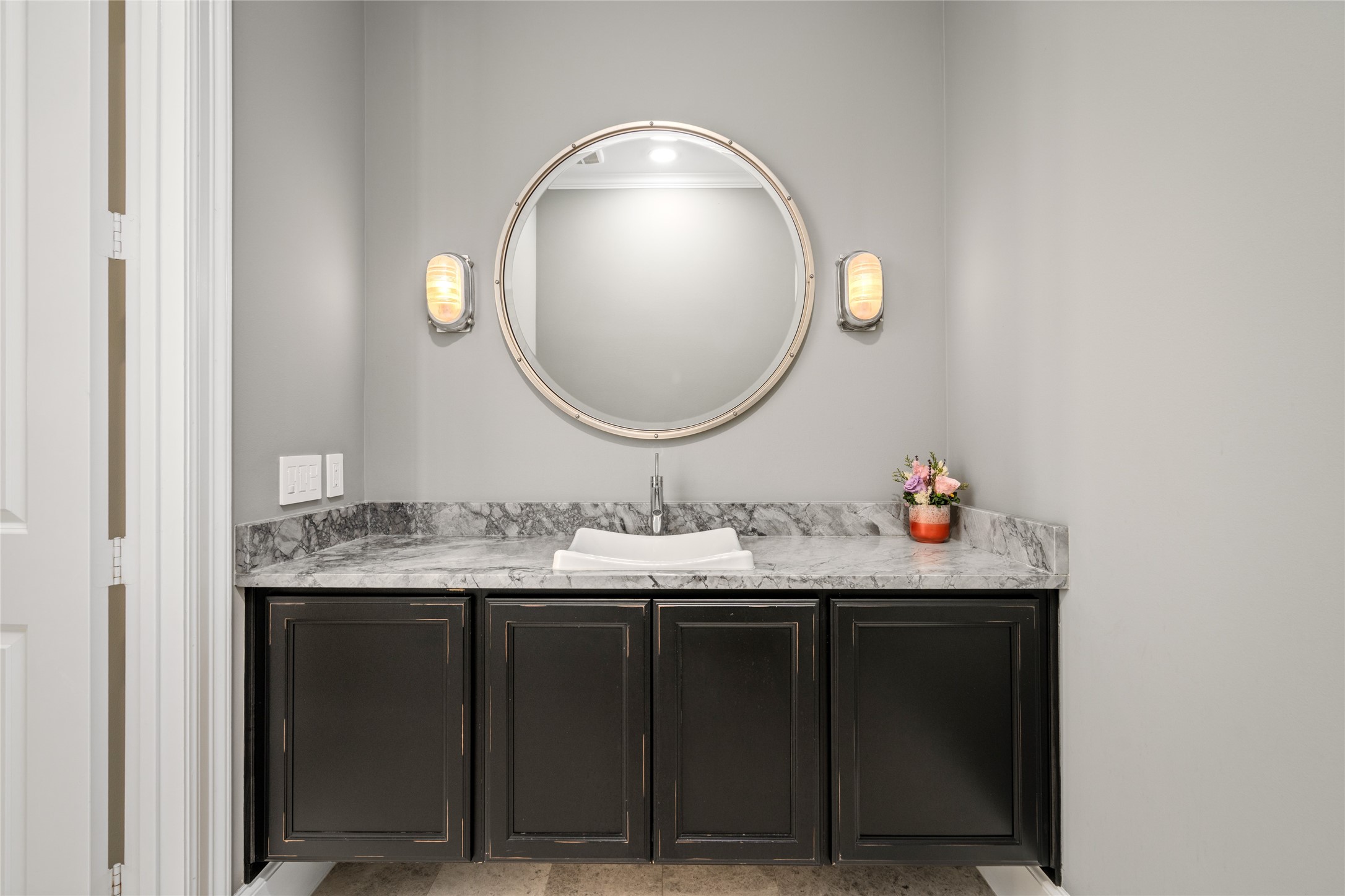 64 South Parkgate Circle Spring, TX 77381 - Photo 13 of 50 a bathroom with a sink and a mirror