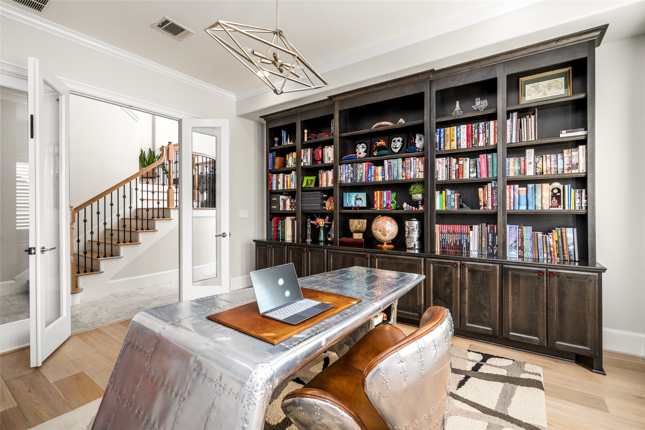 64 South Parkgate Circle Spring, TX 77381 - Photo 14 of 50 a living room with lots of furniture and a book shelf