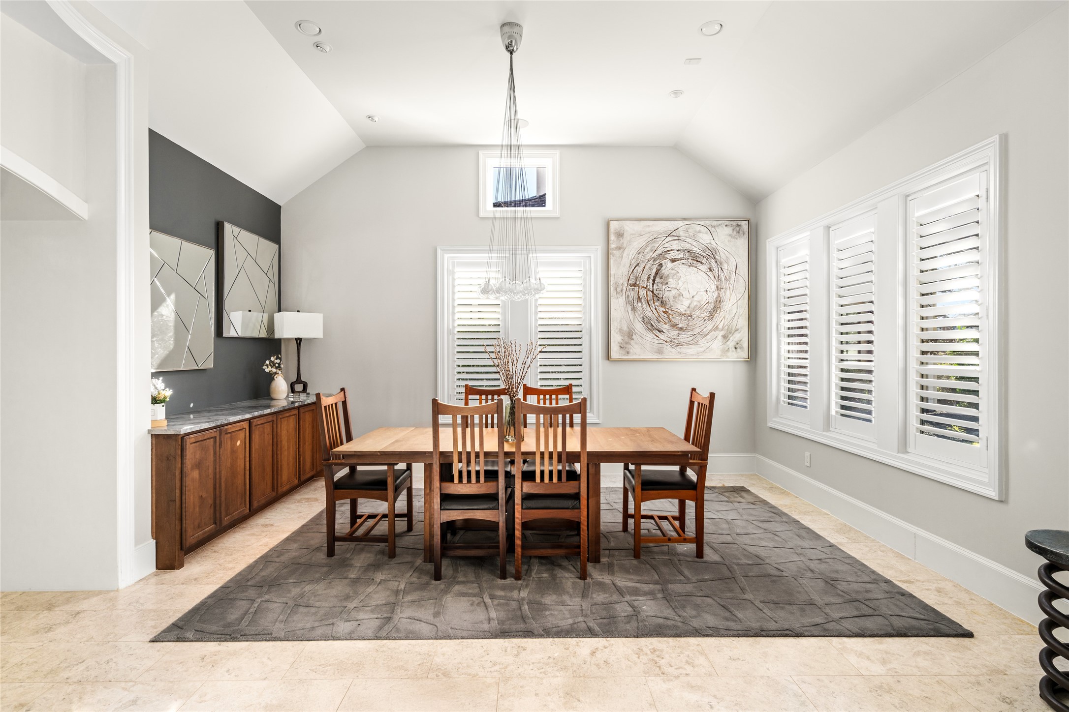 64 South Parkgate Circle Spring, TX 77381 - Photo 15 of 50 a dining room with wooden floor a chandelier a wooden table and chairs