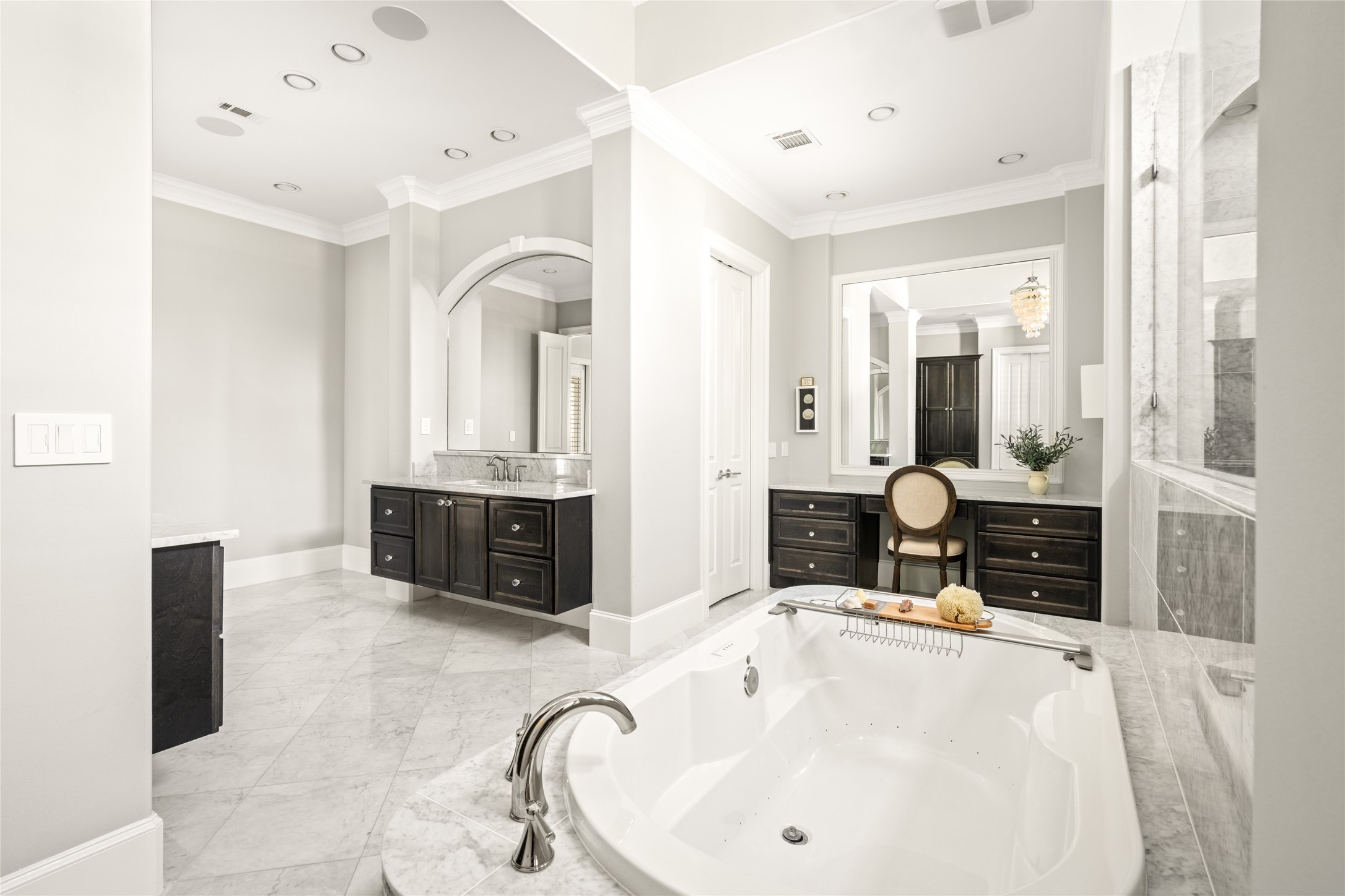 64 South Parkgate Circle Spring, TX 77381 - Photo 28 of 50 a spacious bathroom with a double vanity sink large mirror and bathtub