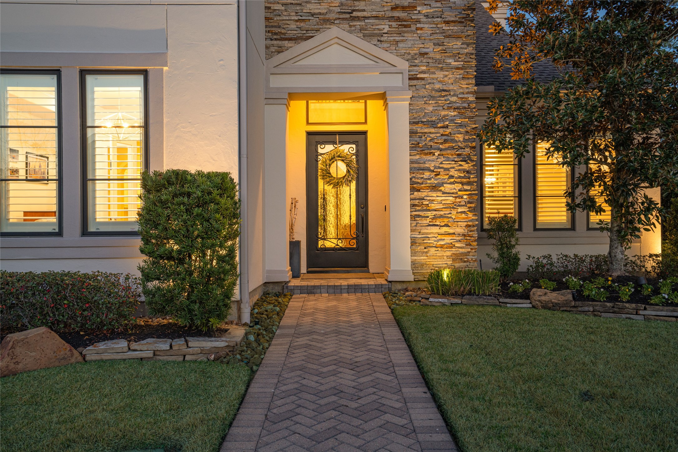 64 South Parkgate Circle Spring, TX 77381 - Photo 3 of 50 a front view of a house with a yard