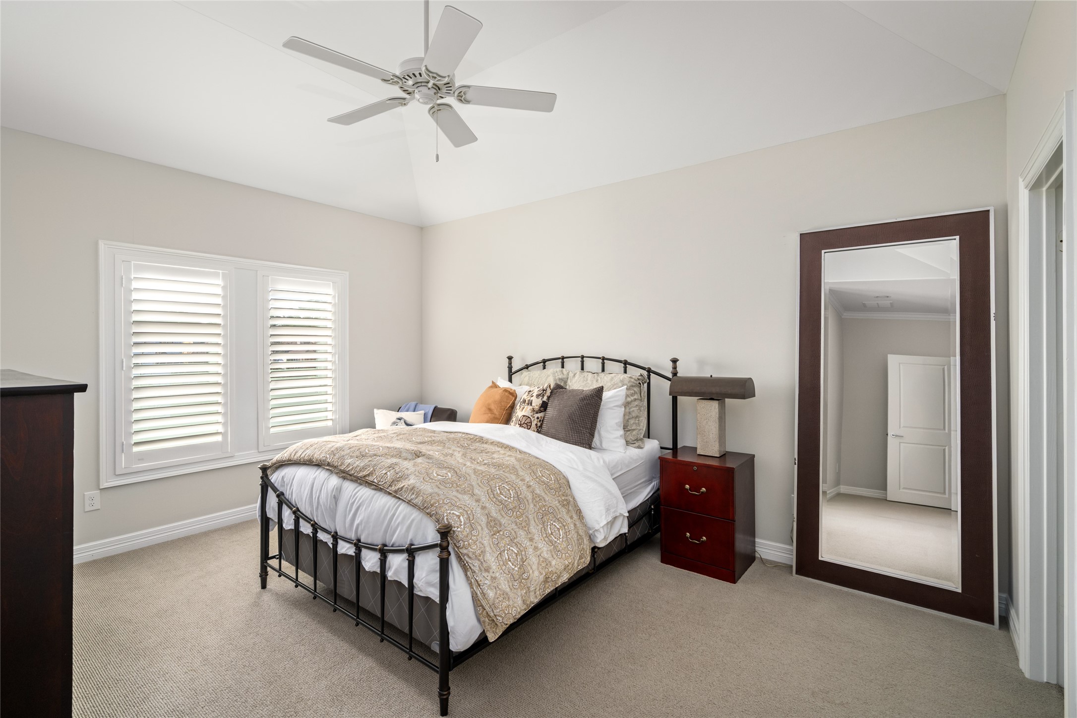 64 South Parkgate Circle Spring, TX 77381 - Photo 33 of 50 a bedroom with a bed chandelier and a window