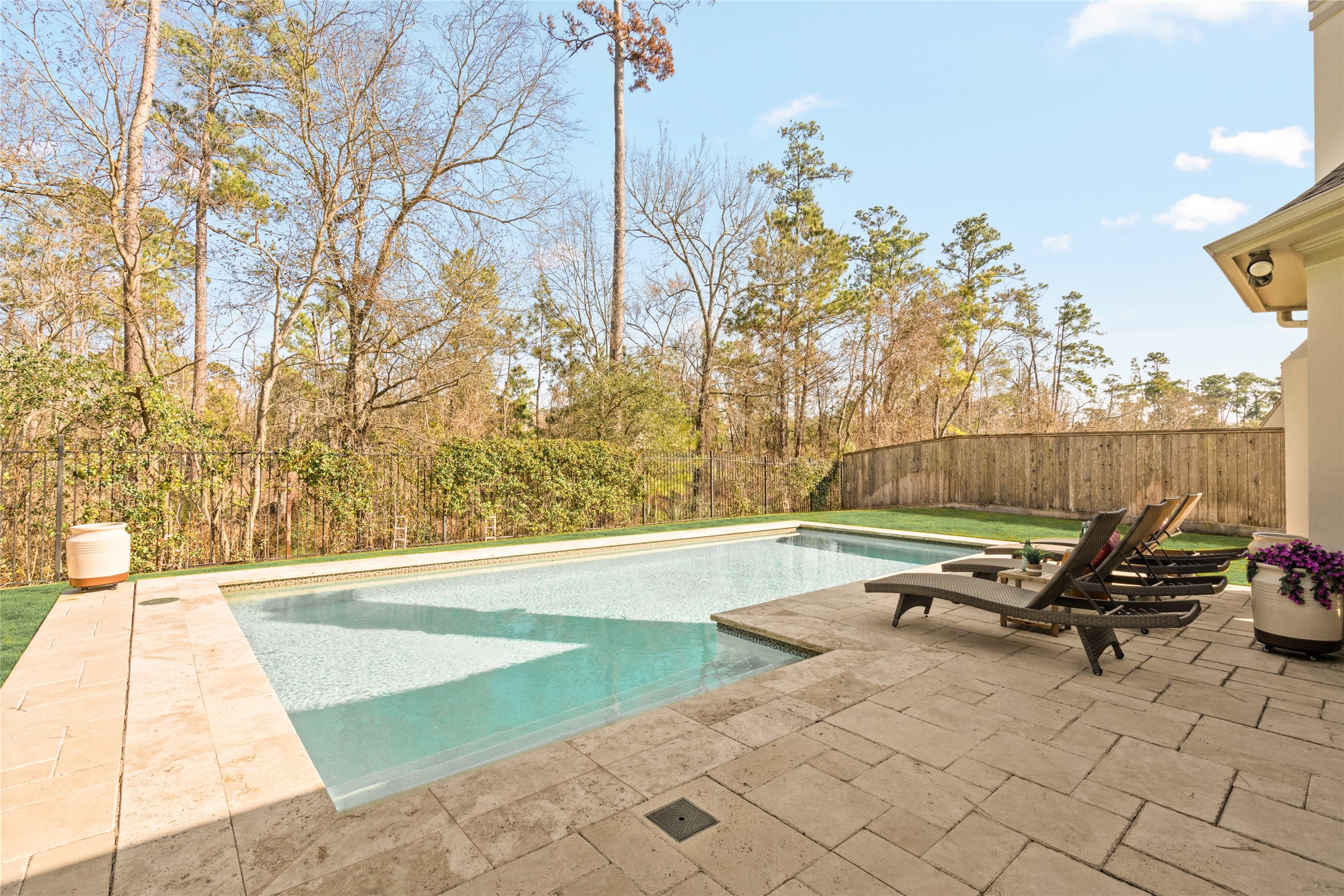 64 South Parkgate Circle Spring, TX 77381 - Photo 43 of 50 a view of a lounge chair and table in the backyard