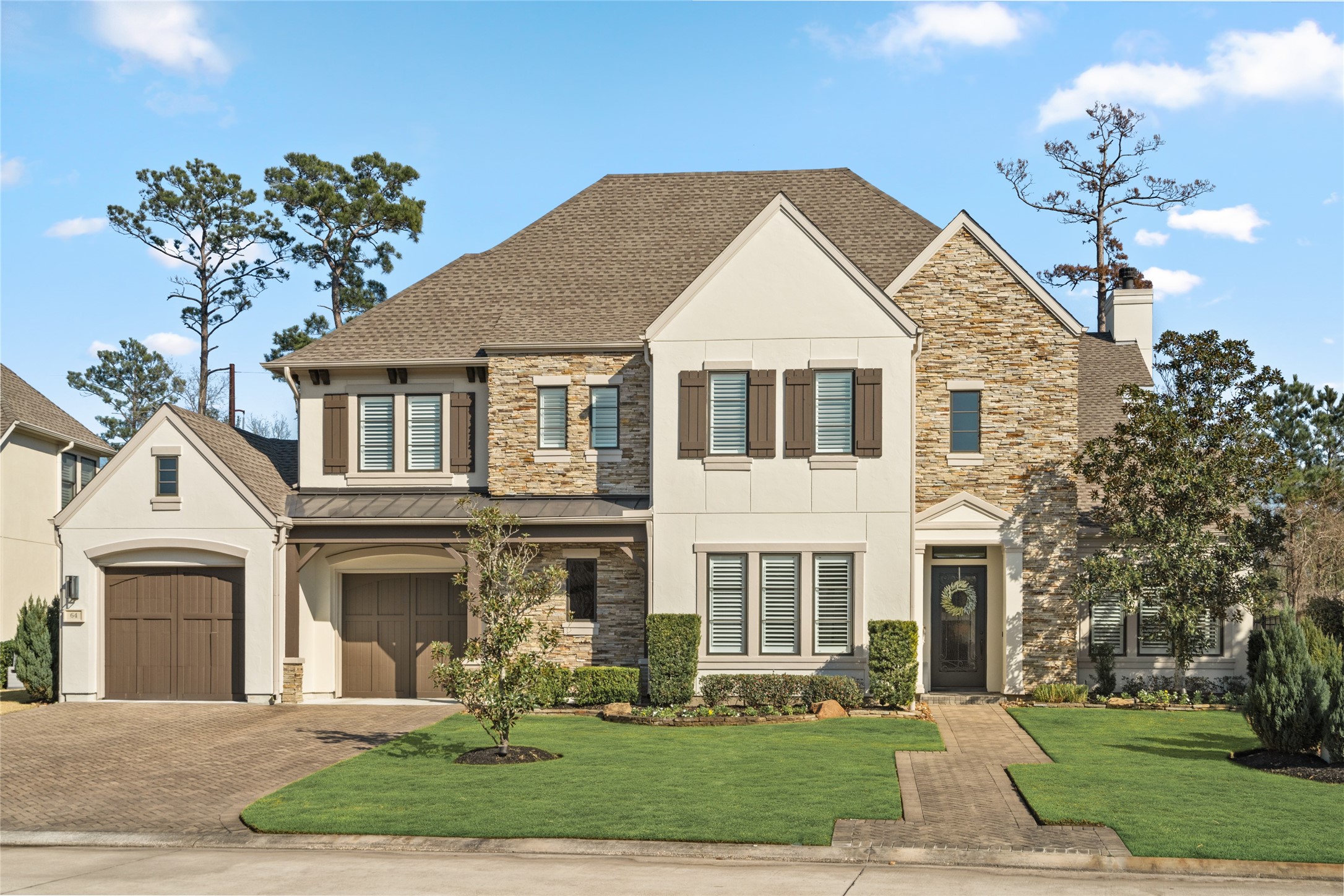 64 South Parkgate Circle Spring, TX 77381 - Photo 8 of 50 a front view of a house with a yard