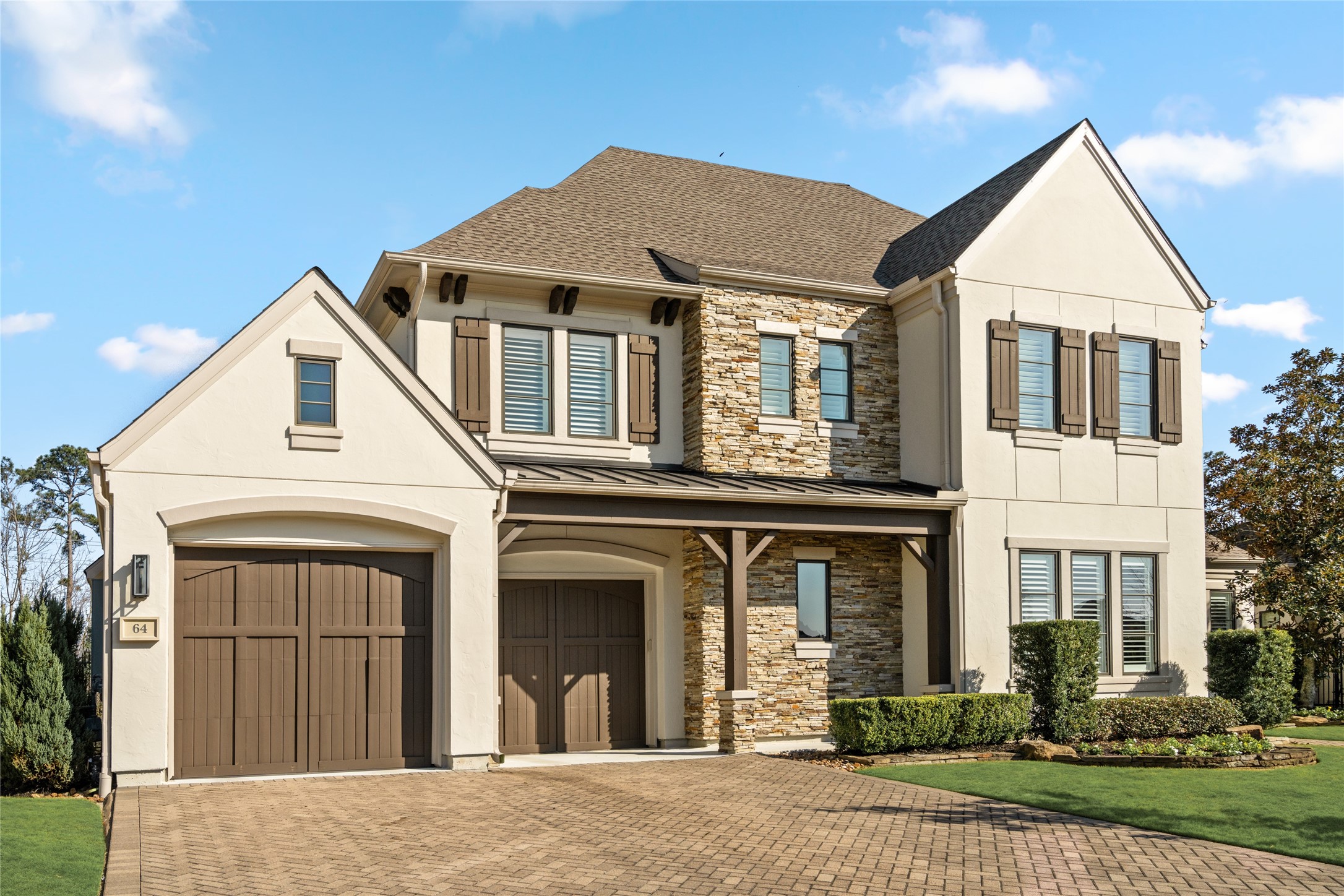 64 South Parkgate Circle Spring, TX 77381 - Photo 9 of 50 a view of a white house with a yard and plants
