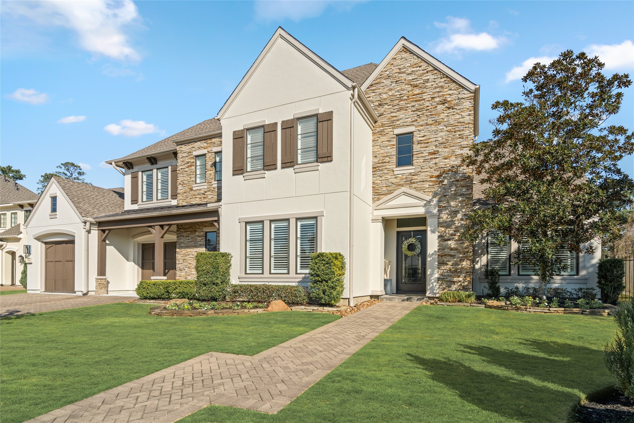 64 South Parkgate Circle Spring, TX 77381 - Photo 10 of 50 a front view of a house with a yard