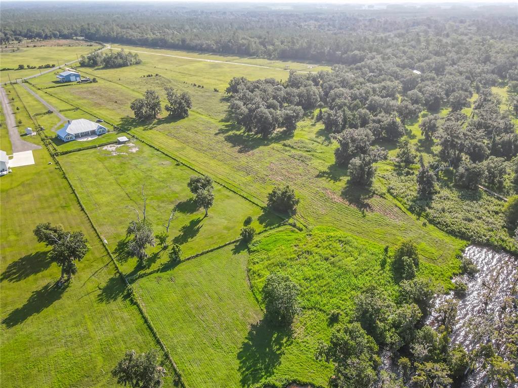 14453 Andalusia Trail Bunnell, FL 32110 - Photo 13 of 23 a view of a lake