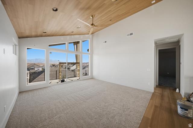 3011 East Rimrunner Drive, Unit 302 St. George, UT 84790 - Photo 28 of 45 Unfurnished room with a vaulted wood ceiling, ceiling fan, a mountain view, and recessed lighting