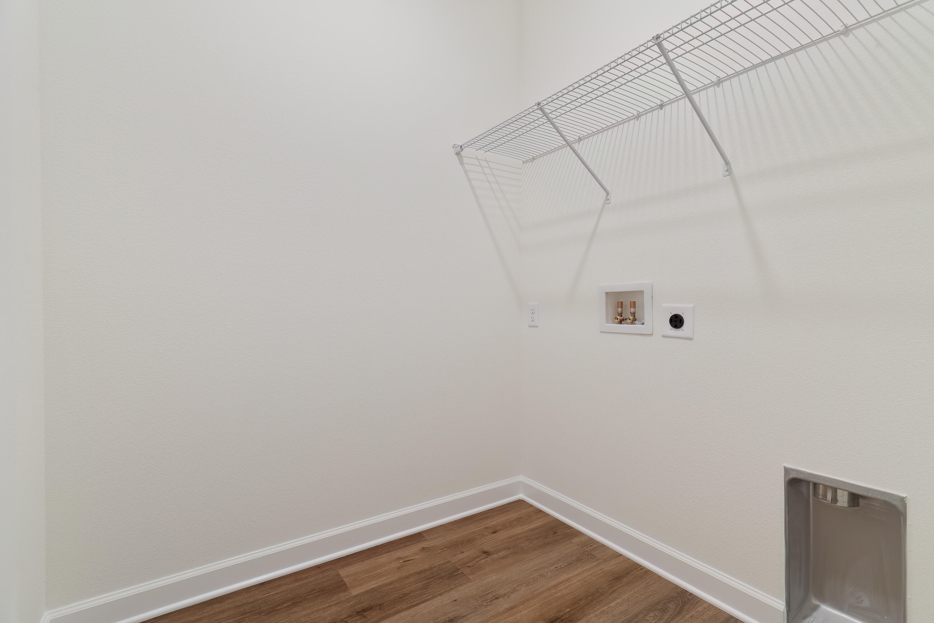 2831 Blackbird Court Crestview, FL 32539 - Photo 17 of 19 a view of a room with wooden floor