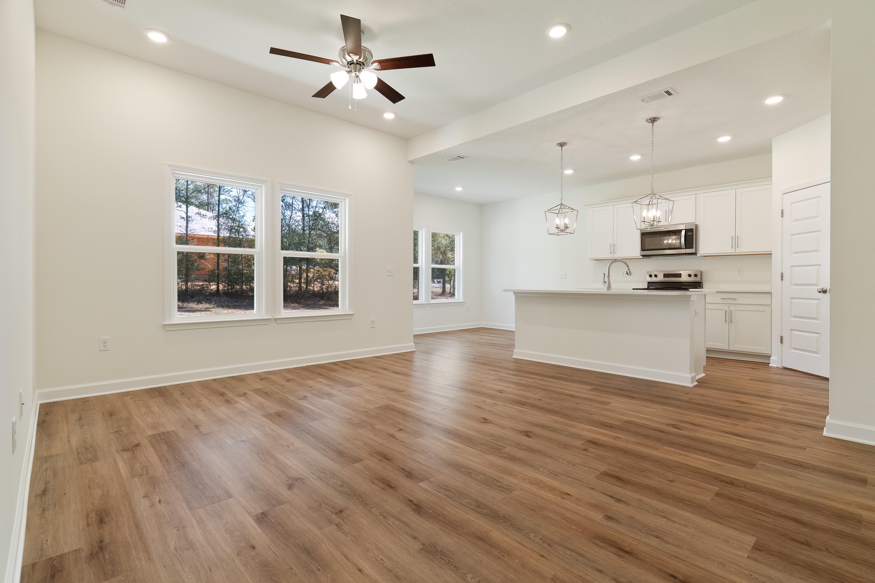 2831 Blackbird Court Crestview, FL 32539 - Photo 6 of 19 a view of a kitchen with wooden floor and a kitchen