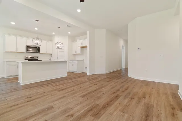 a view of kitchen with wooden floor