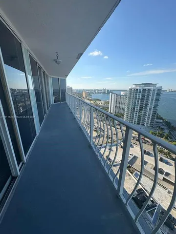 a view of a balcony with an ocean view
