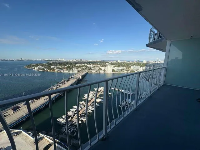 a view of livingroom with floor to ceiling window