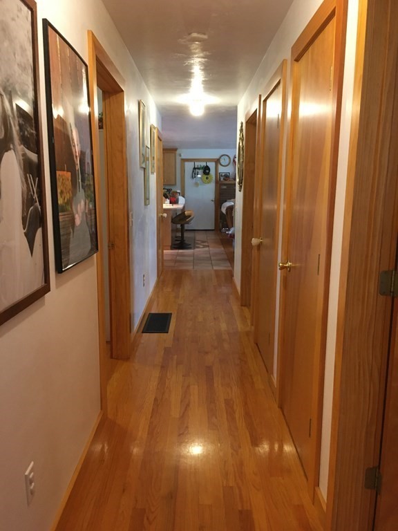 116-120 Thompson Road Webster, MA 01570 - Photo 14 of 39 a view of hallway with livingroom