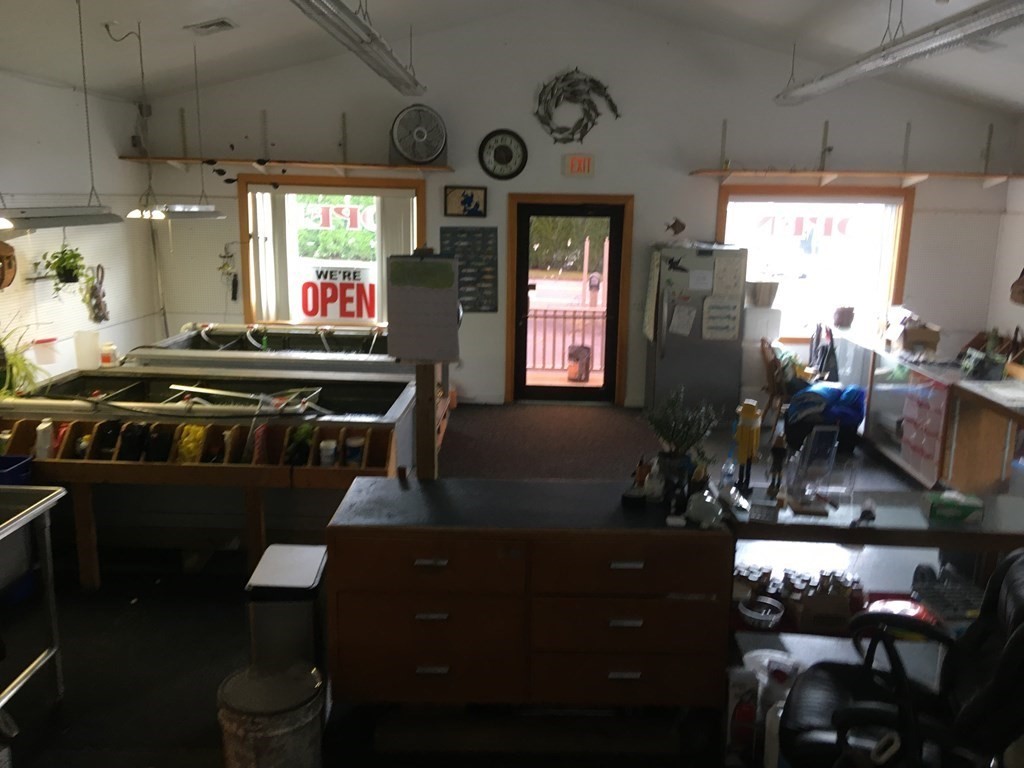 116-120 Thompson Road Webster, MA 01570 - Photo 21 of 39 a kitchen with table and chairs in it