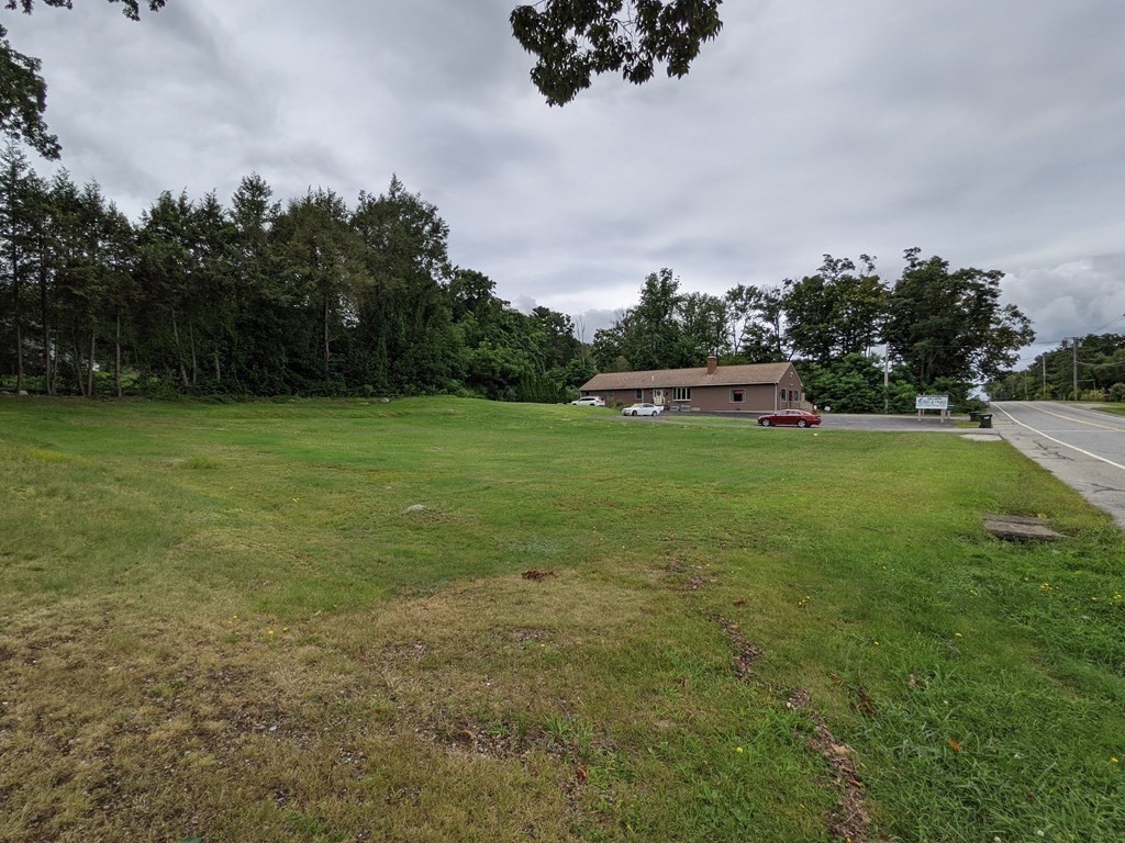 116-120 Thompson Road Webster, MA 01570 - Photo 22 of 39 a view of a field of grass and trees