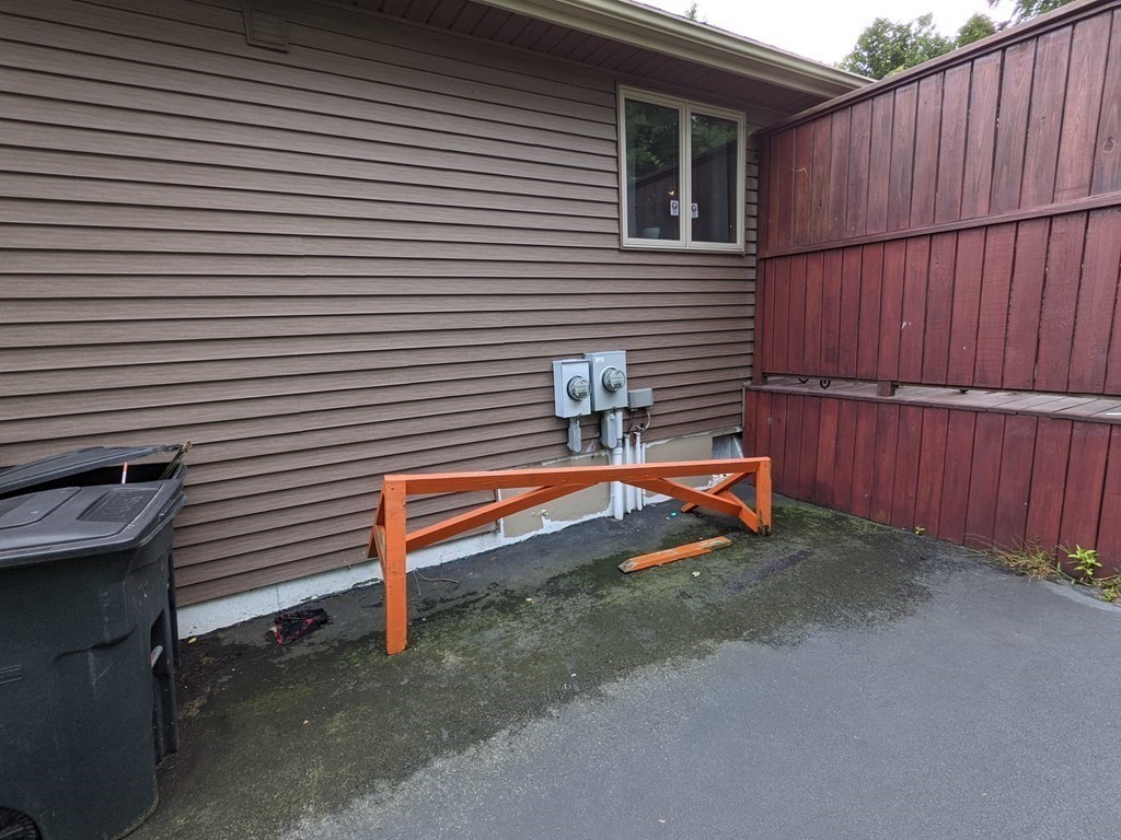 116-120 Thompson Road Webster, MA 01570 - Photo 26 of 39 a backyard of a house with wooden fence