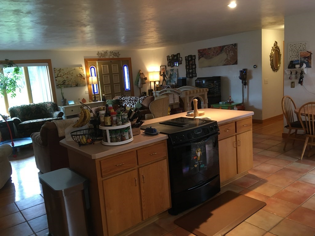 116-120 Thompson Road Webster, MA 01570 - Photo 3 of 39 a kitchen with a sink stove and cabinets